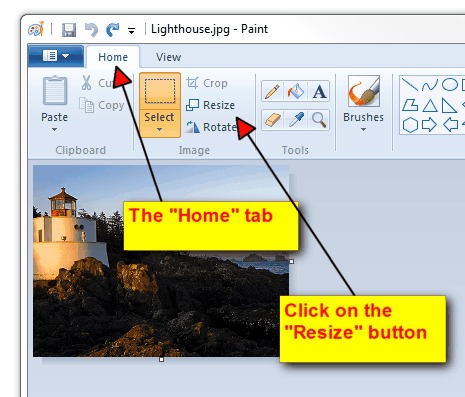 click on home tab and then resize button